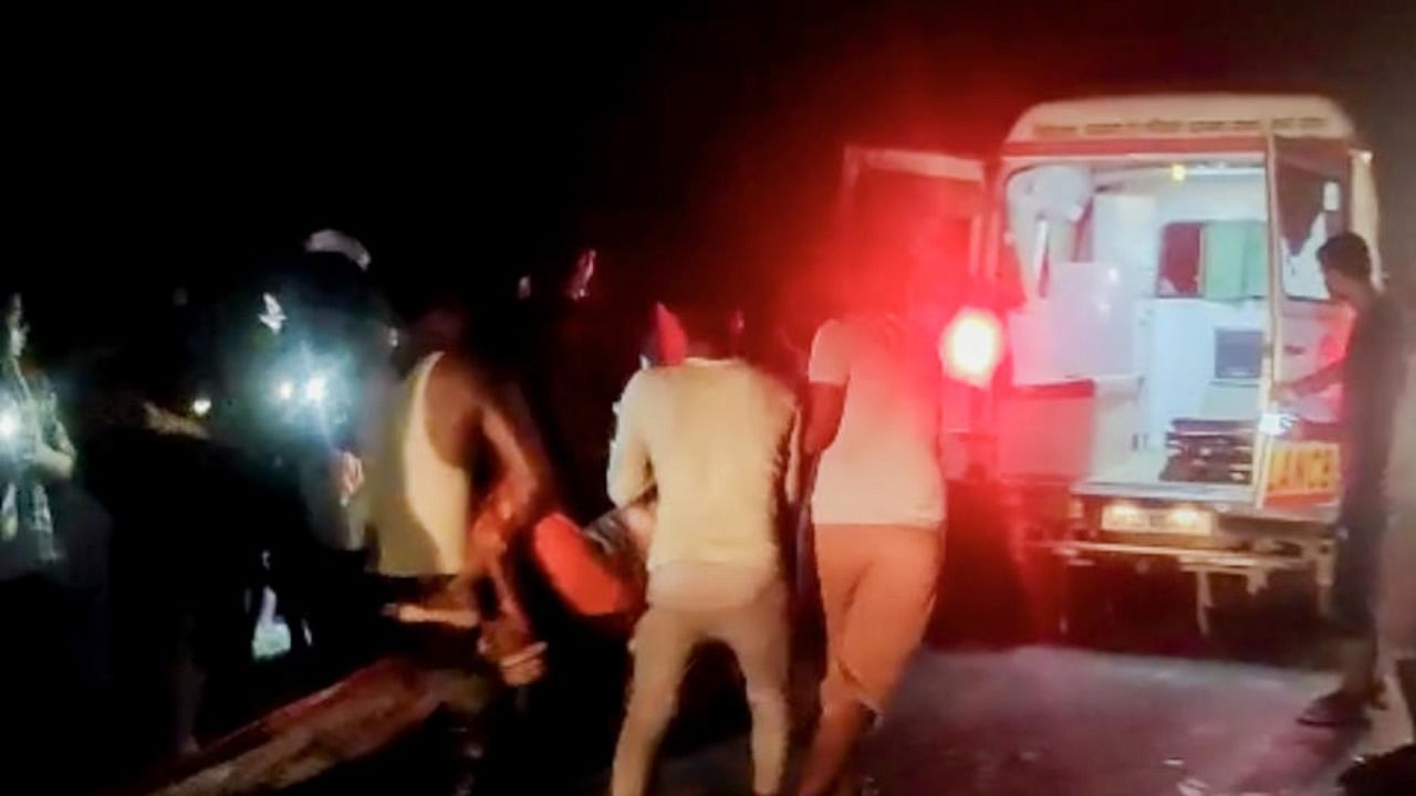  Injured being taken for treatment after a tractor carrying people met with an accident, at Ghatampur area in Kanpur district, Saturday night, Oct. 1, 2022. Credit: PTI Photo