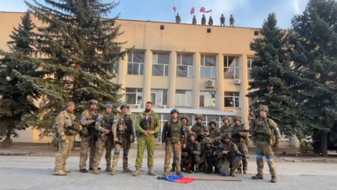 Ukrainian armed forces make a statement in front of Lyman Town Administration office, in Lyman, Ukraine, in this still image taken from a social media video, released on October 1, 2022. Credit: Reuters via 81 Airborne Brigade of the Ukrainian Armed Forces