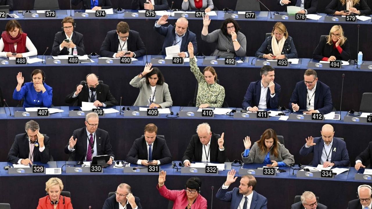 Members of the European Parliament take part in a voting session on the Radio Equipment Directive for a common charger for electronic devices during a plenary session at the European Parliament in Strasbourg, eastern France. Credit: AFP Photo