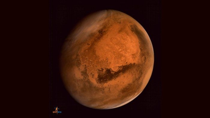In this photo taken on September 30, 2014 a handout photograph received from the Indian Space Research Organisation (ISRO) shows an image of the planet Mars taken by the ISRO Mars Orbiter Mission (MOM) spacecraft. Credit: AFP File Photo