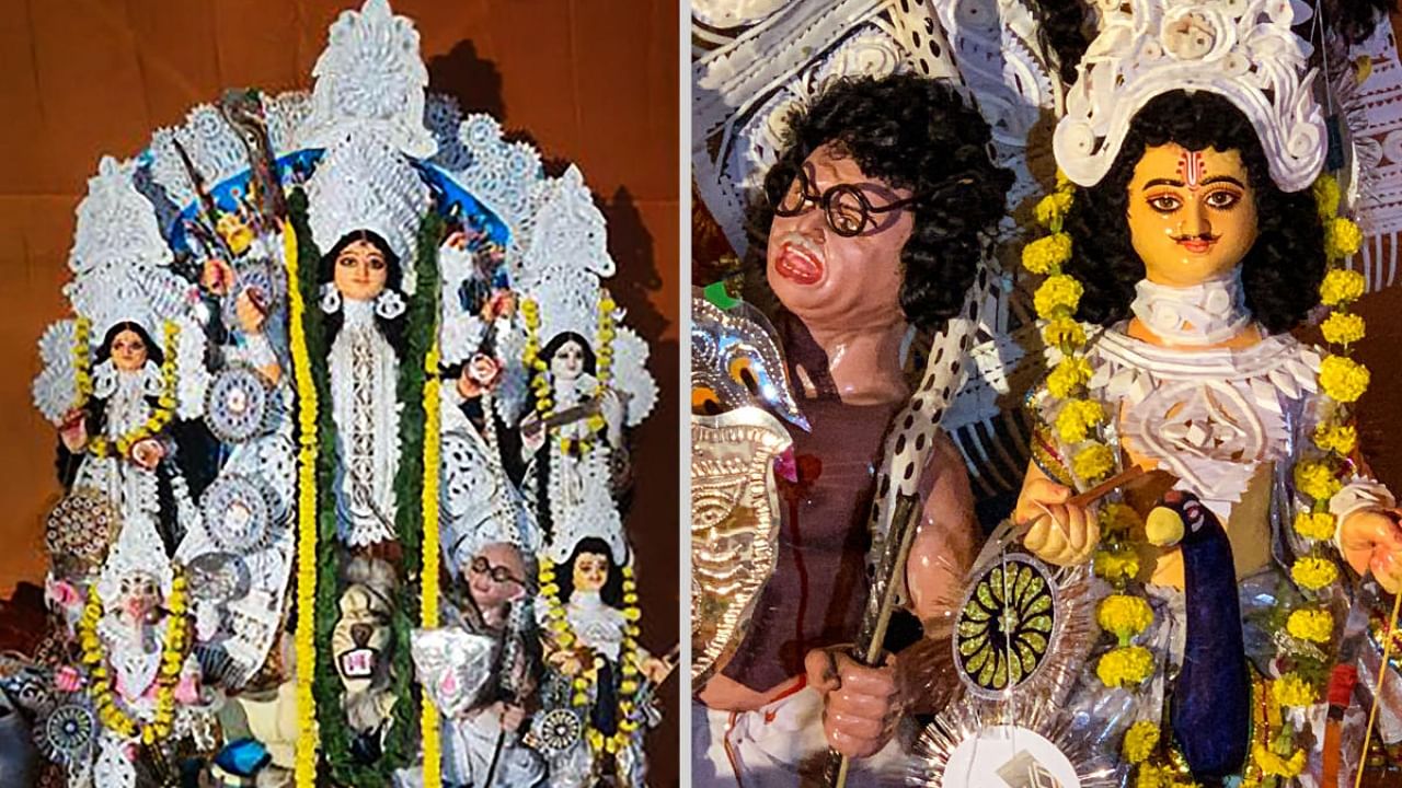 A Durga idol in which the 'Mahisasura' was replaced by a Mahatma Gandhi-look alike (left) created controversy on the birth anniversary of the Mahatma. Credit: PTI Photo