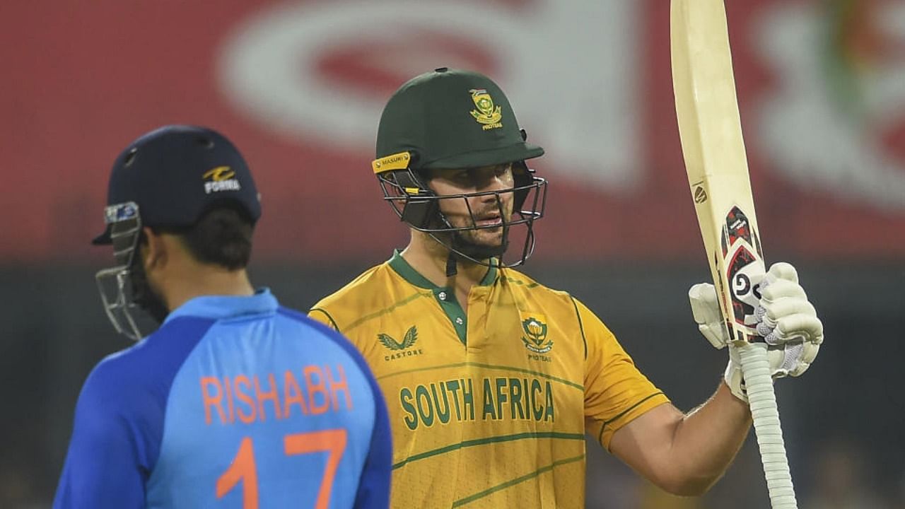 South Africa batsmen Rilee Rossouw celebrates his fifty during the 3rd T20 cricket match between India and South Africa, at the Holkar Stadium in Indore, Tuesday, Oct. 4, 2022. Credit: PTI Photo
