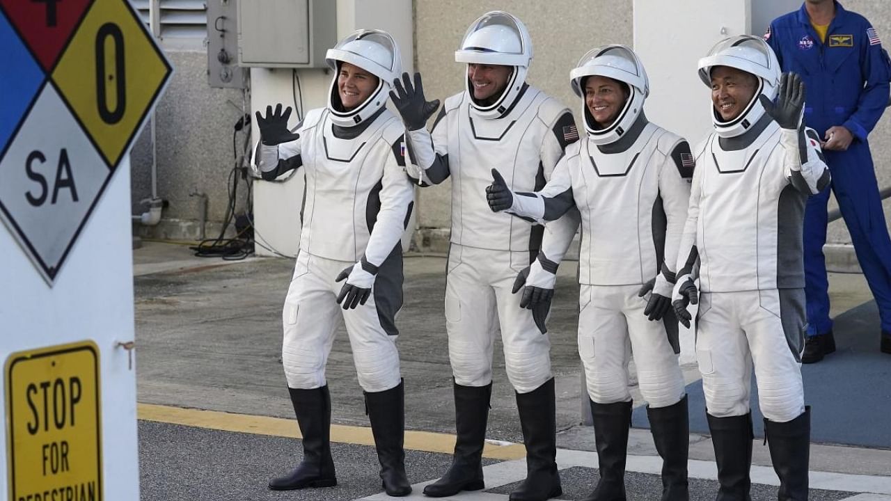 SpaceX Crew5 astronauts, from left, Anna Kikina, of Russia, Josh Cassada, Nicole Mann, and Koichi Wakata, of Japan, pose for a photo as they leave the Operations and Checkout building before heading to Launch Pad 39-A at the Kennedy Space Center in Cape Canaveral, Fla., for a mission to the International Space Station Wednesday, October 5, 2022. Credit: AP/PTI