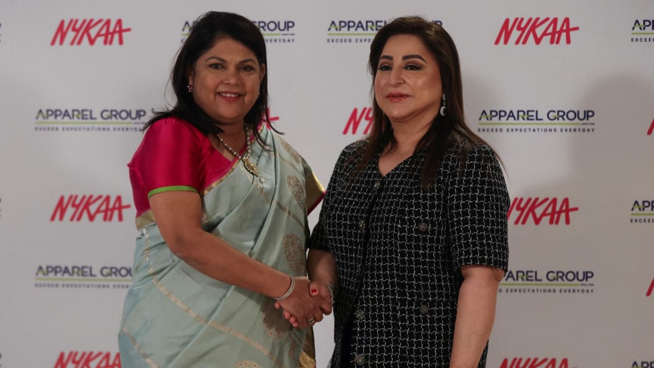 Falguni Nayar, founder and CEO of the beauty and lifestyle retail company Nykaa and Sima Ganwani Ved, Founder and Chairwoman of fashion and lifestyle retail conglomerate, Apparel Group pose for a picture during a strategic alliance announcement in Mumbai. Credit: Reuters photo