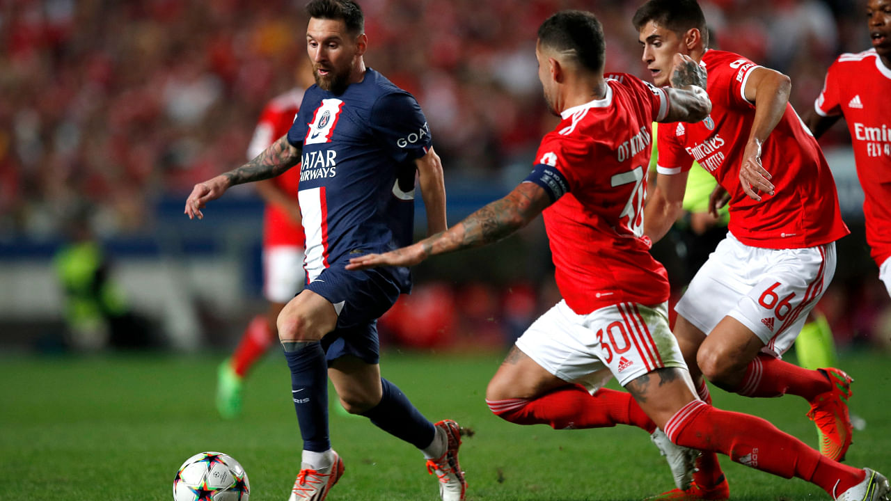 Paris St Germain's Lionel Messi in action with Benfica's Nicolas Otamendi. Credit: Reuters Photo