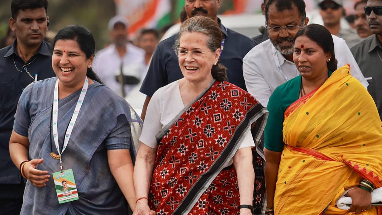 Congress interim President Sonia Gandhi with party workers during the party's 'Bharat Jodo Yatra', in Mandya district. Credit: PTI Photo