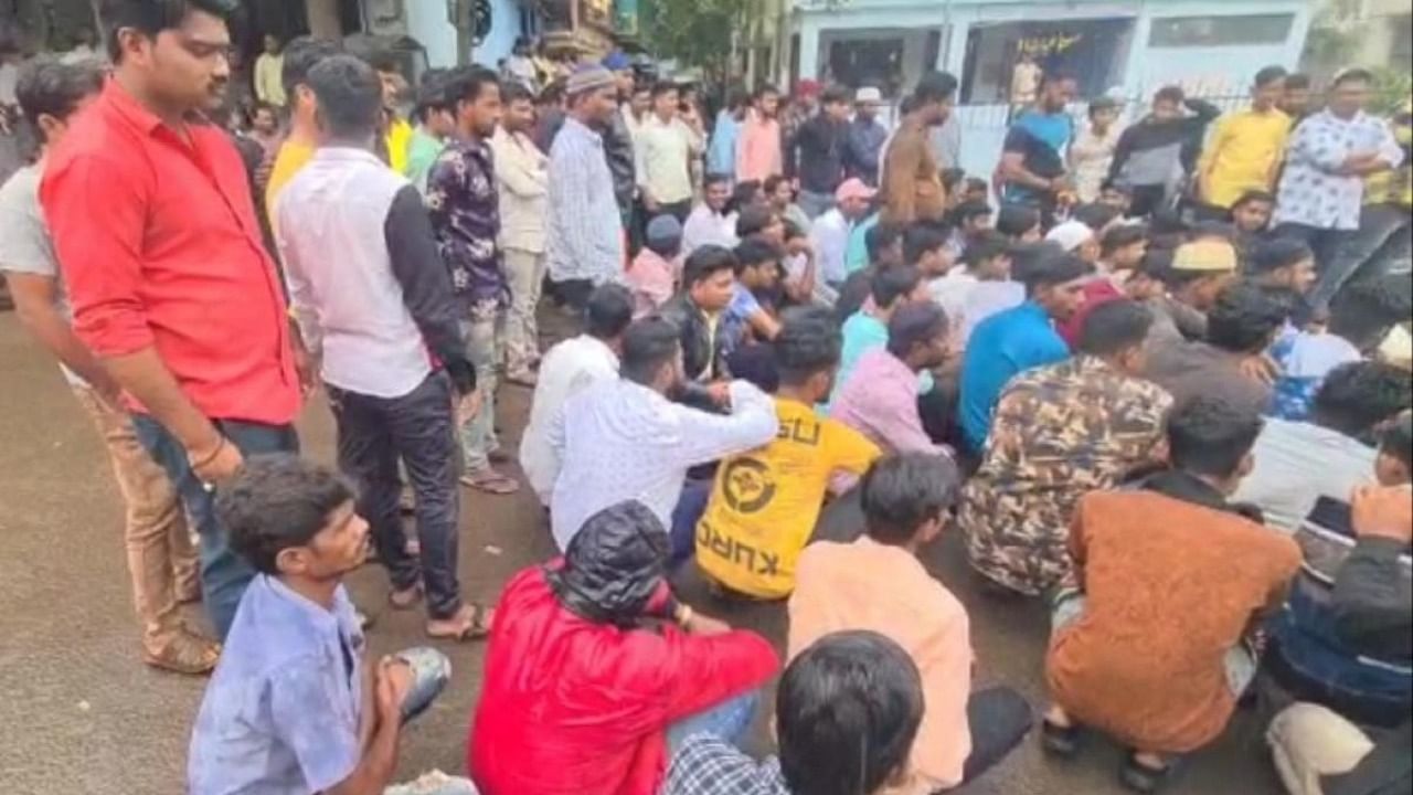 Muslim youth protested in the premises of Town Police Station in Old City of Bidar, demanding that the miscreants who tried to damage the Mahmood Gawan memorial should be arrested and strict action should be taken. Credit: Special arrangement