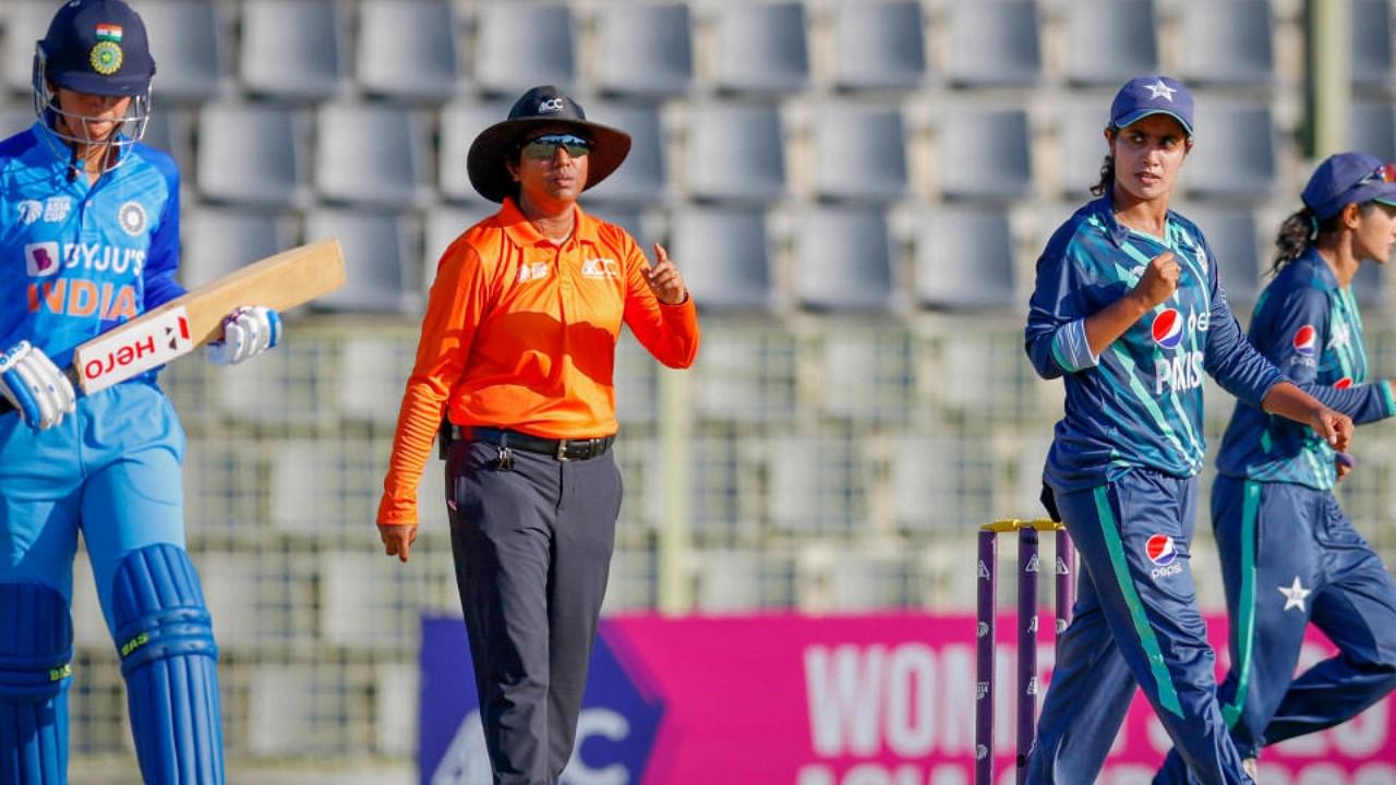 Indian women's cricket team player walks back to the pavillion after being dismissed during the Women's Asia Cup 2022 cricket match between India and Pakistan, at Sylhet International Cricket Stadium, Sylhet. Credit: PTI Photo