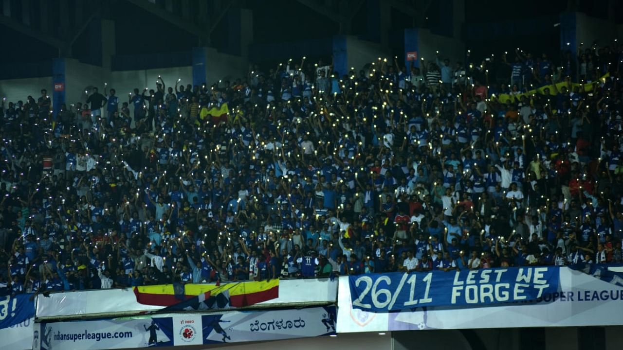 Bengaluru FC’s supporters, during the ISL league football match at Sree Kanteerava Stadium in Bengaluru on Sunday. Credit: DH Photo/ B H Shivakumar