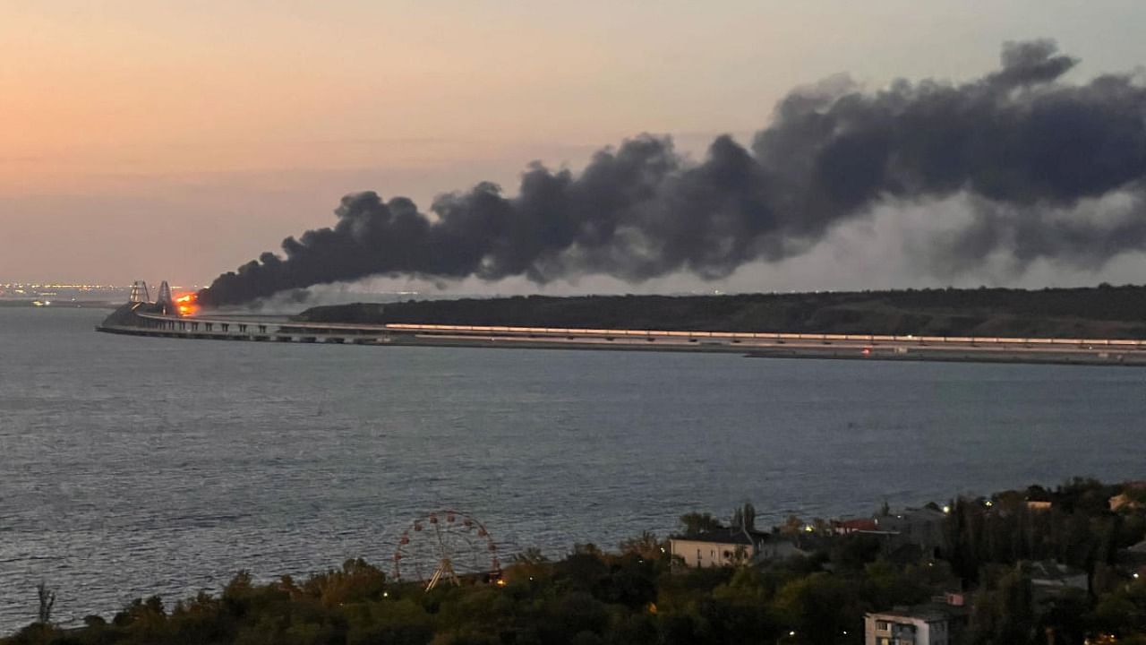 A view shows a fire on the Kerch bridge at sunrise in the Kerch Strait, Crimea. Credit: Reuters photo