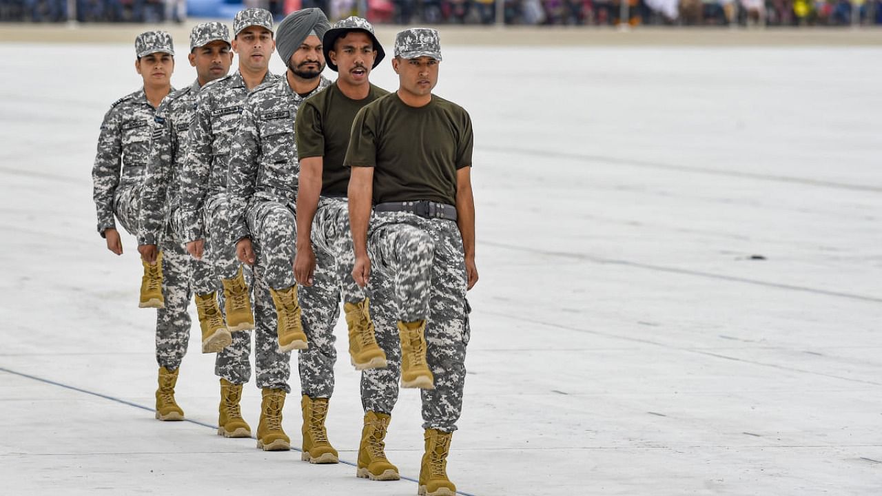  Air Force personnel perform a march-past during 90th anniversary celebrations of Indian Air Force. Credit: PTI Photo