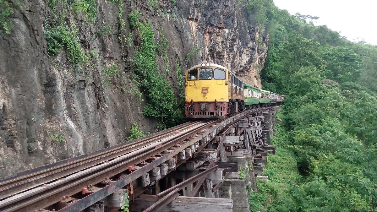 A train passing through the bridge on the River Kwai