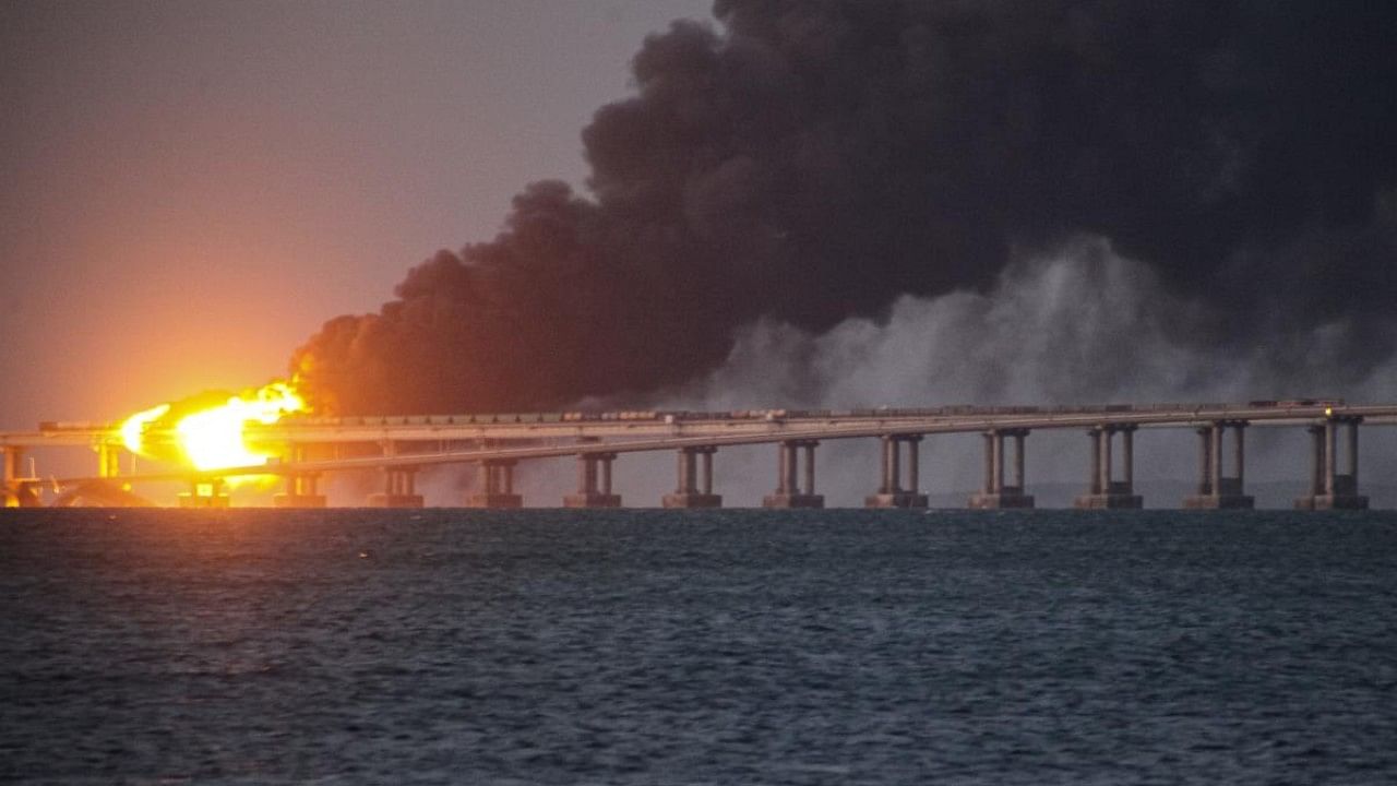 Flame and smoke rise from Crimean Bridge. Credit: AP Photo