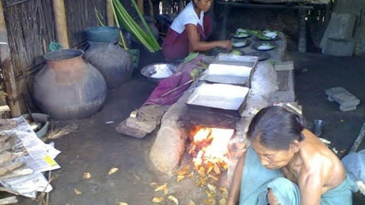 Local women engaged in traditional art of making salt cakes at a work shed in Manipur's Ningel village. Credit: PTI Photo