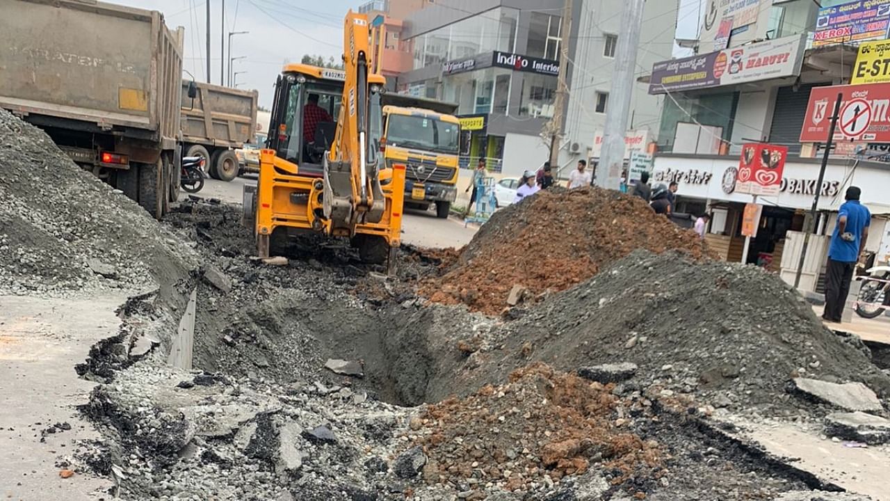 Vehicular movement from Varthur towards Marathahalli was disrupted as one lane was blocked to barricade the damaged portion. Credit: Special Arrangement