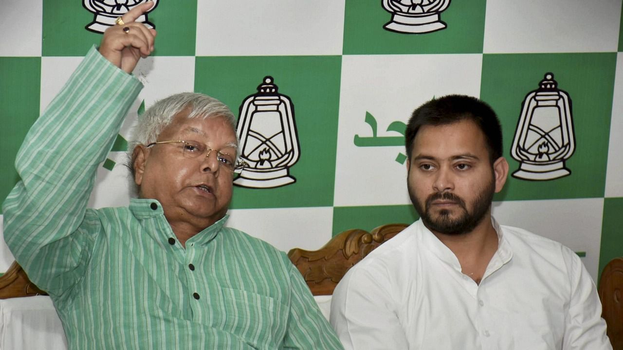 Lalu Prasad and Tejashwi Yadav. Credit: PTI File Photo