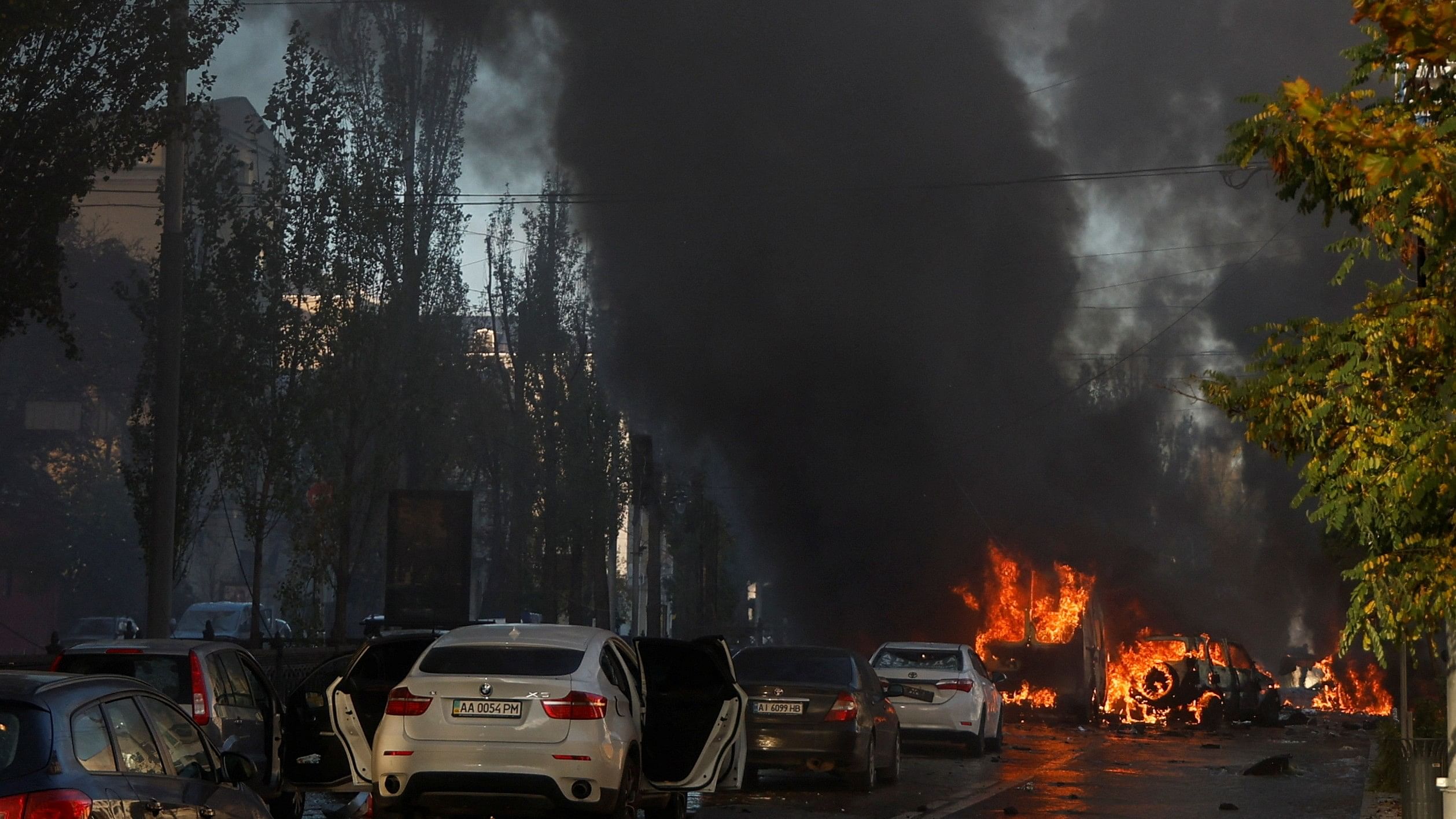 Cars are on fire after Russia's missile attack in Kyiv, Ukraine October 10, 2022. Credit: Reuters Photo