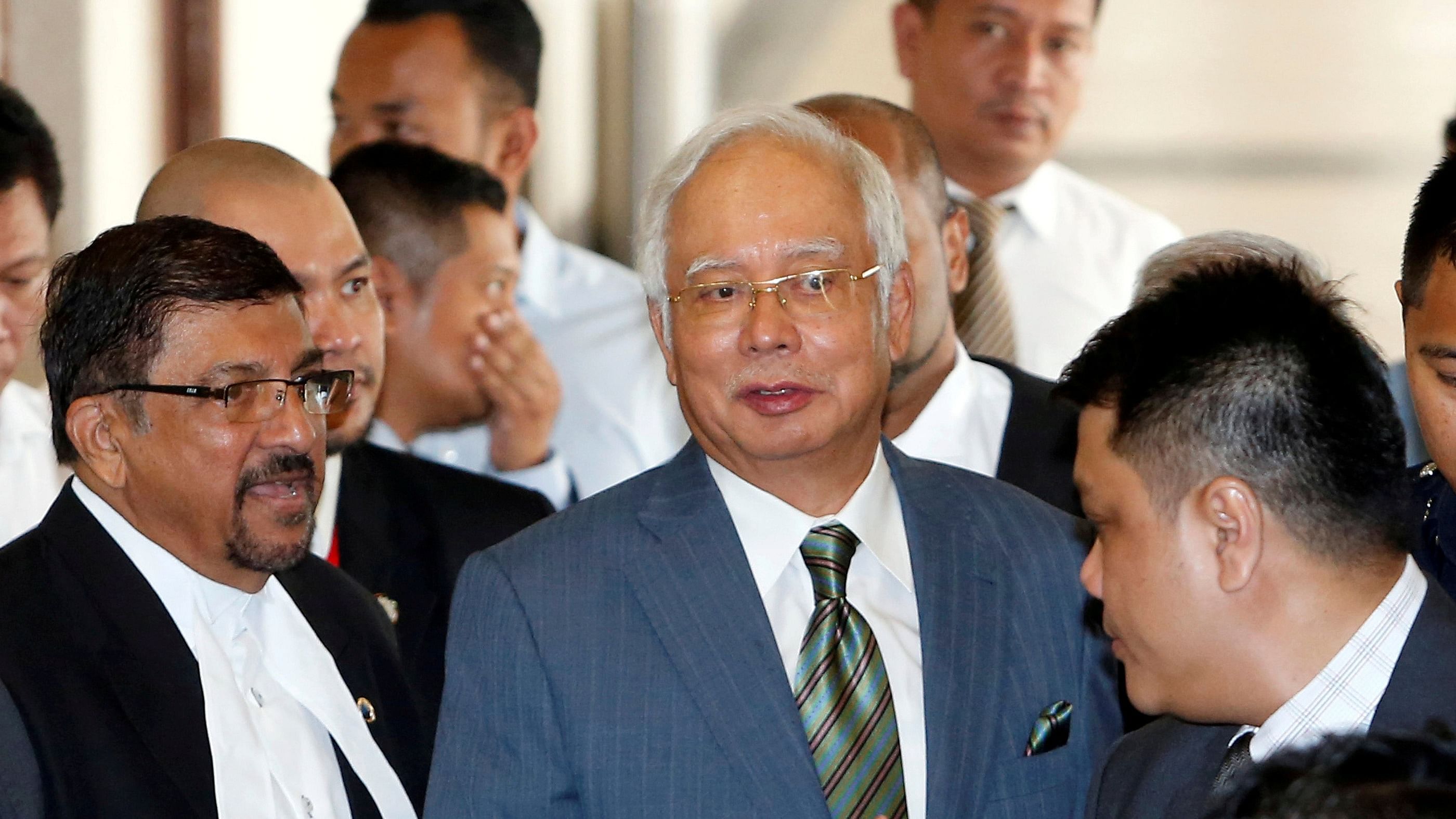 Malaysia's former prime minister Najib Razak walks out of a courtroom in Kuala Lumpur. Credit: Reuters Photo