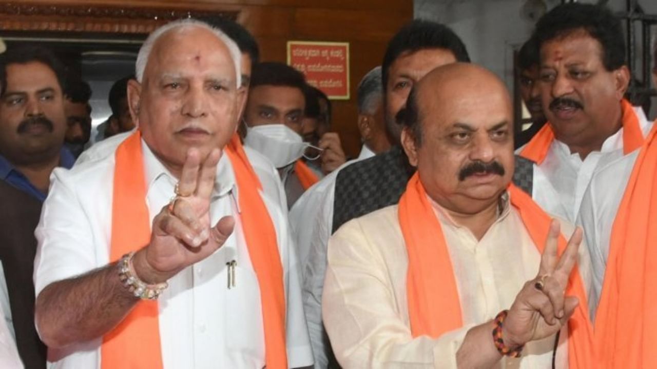 Karnataka Chief Minister Basavaraj Bommai and B S Yediyurappa. Credit: DH Photo