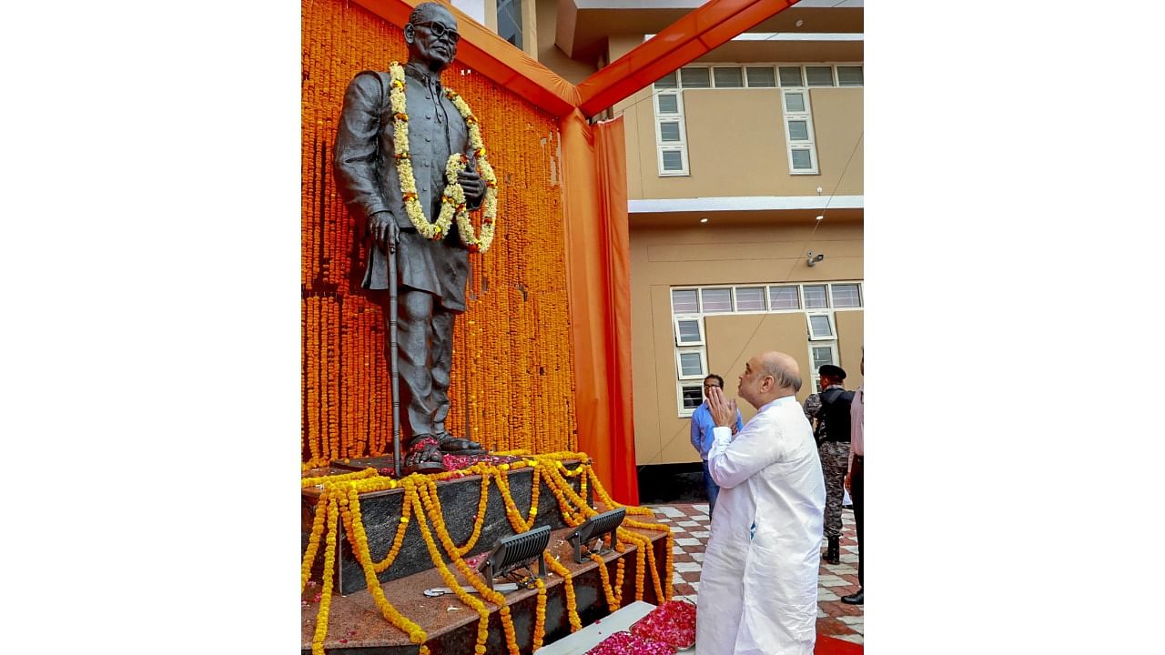 Union Home Minister Amit Shah pays tribute after unveiling a statue of Loknayak Jayaprakash Narayan, in Sitab Diara, Bihar, Tuesday, Oct. 11, 2022. Credit: PTI Photo