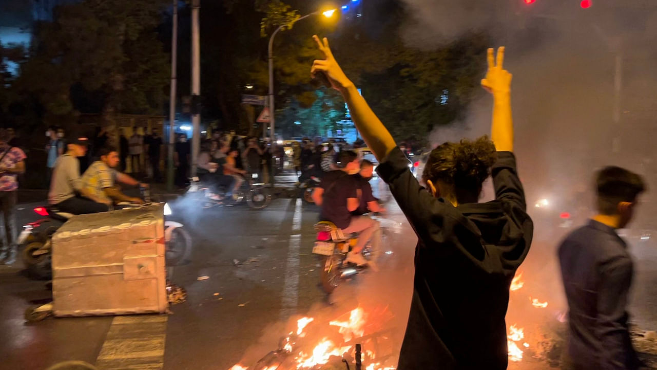 A man gestures during a protest over the death of Mahsa Amini, a woman who died after being arrested by the Islamic republic's "morality police", in Tehran, Iran September 19, 2022. Credit: Reuters File Photo via WANA