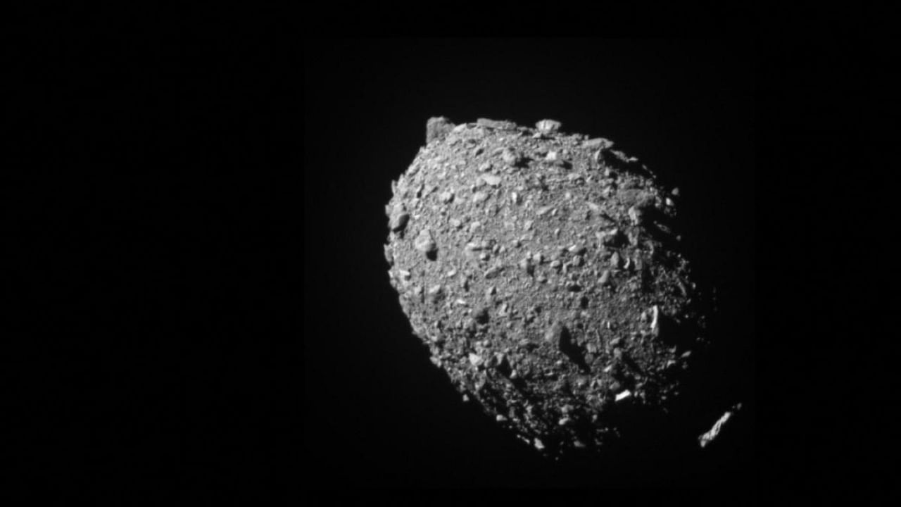 This picture provided by NASA on October 11, 2022 shows asteroid moonlet Dimorphos as seen by the Double Asteroid Redirection Test (DART) spacecraft 11 seconds before impact. - DART’s onboard DRACO imager captured this image from a distance of 42 miles (68 kilometers). Credit: AFP Photo