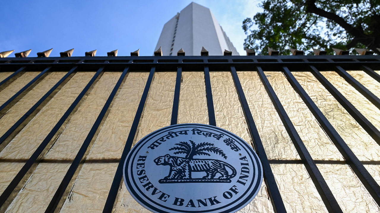 The logo of the Reserve Bank of India (RBI) is pictured on the gate of the bank's head office in Mumbai on November 17, 2021. Credit: AFP File Photo