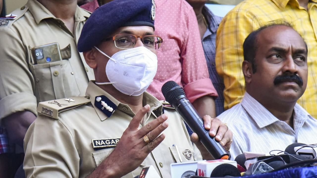 Kochi Police Commissioner CH Nagaraju with investigation team members briefs the media in connection with the Elanthoor human sacrifice case. Credit: PTI Photo