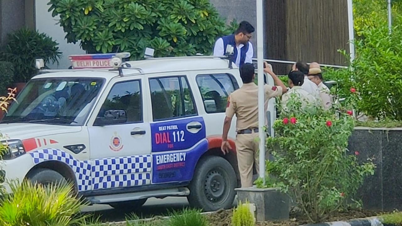 Gujarat AAP President Gopal Italia being detained by the Delhi Police from National Commission of Women's office for allegedly using derogatory language against Prime Minister Narendra Modi, in New Delhi, Thursday, Oct. 13, 2022. Credit: PTI Photo