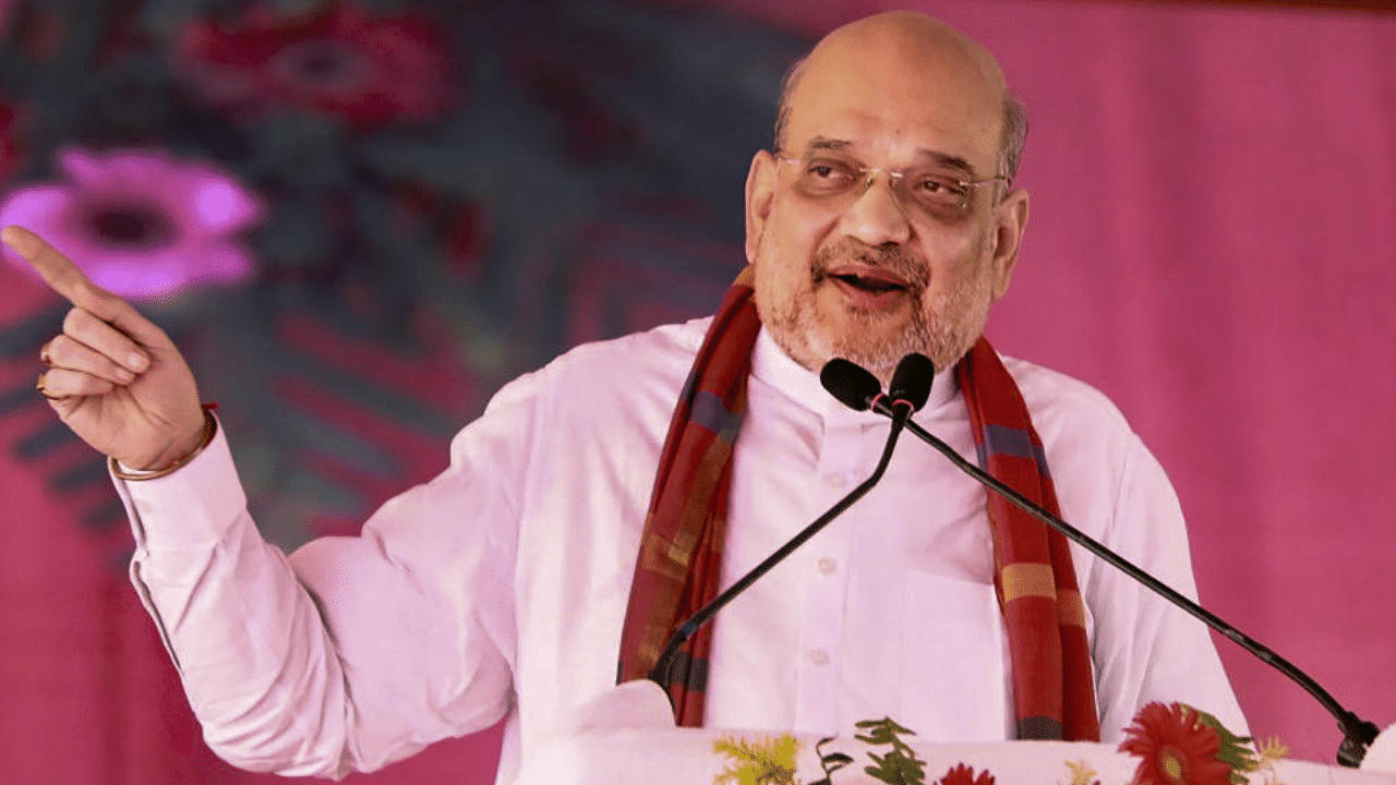  Union Home Minister Amit Shah addresses a public meeting. Credit: PTI Photo