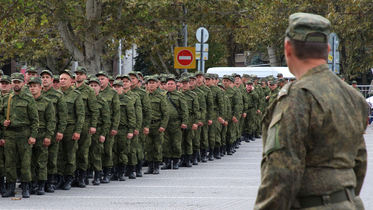 Reservists drafted during the partial mobilisation attend a ceremony before departure for military bases, in Sevastopol, Crimea September 27, 2022. Credit: Reuters File Photo