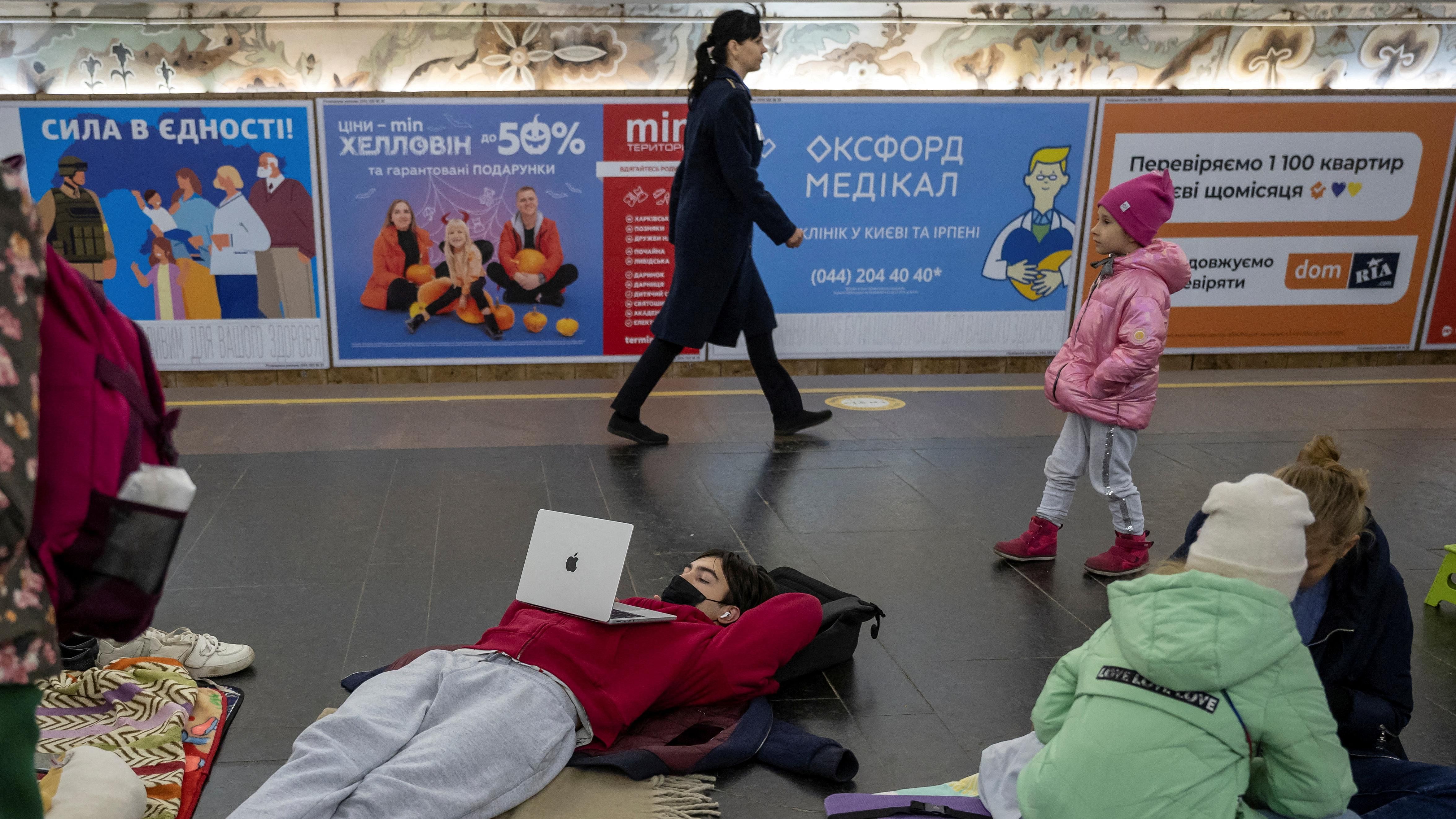 People shelter inside a subway station during a Russian missile attack in Kyiv. Credit: Reuters Photo