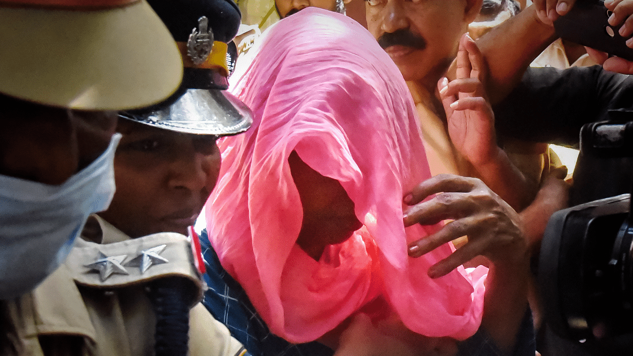 Laila, one of the accused in the Elanthoor 'human sacrifice' case, being produced at court, in Kochi. Credit: PTI Photo