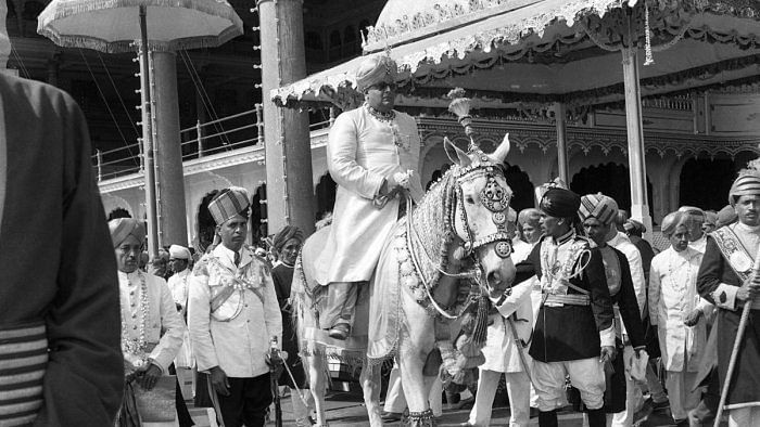 Jayachamarajendra Wadiyar on a decorated horse, during a Dasara procession. Credit: DH archives