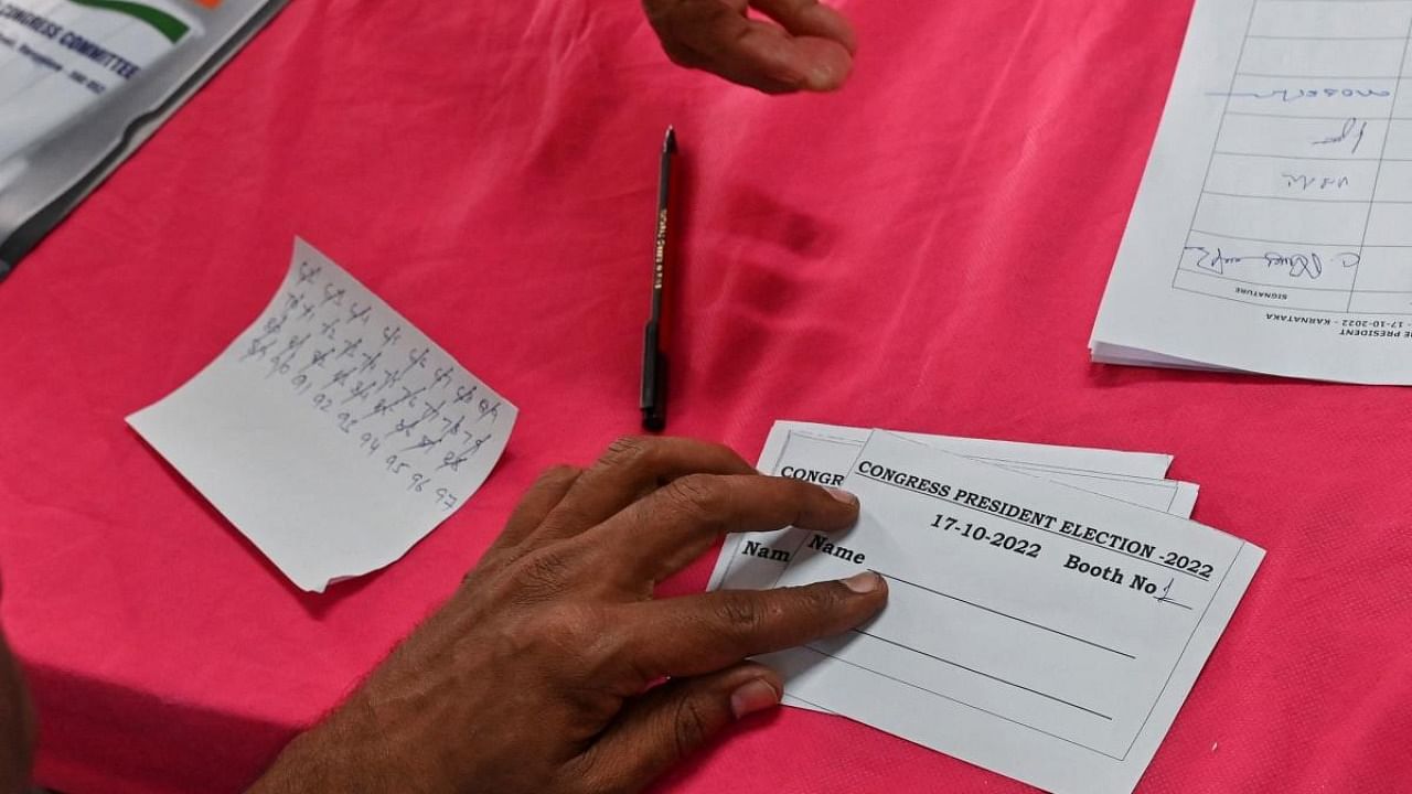 A Congress worker prepares voter’s slip at the Karnataka State Congress office during the elections held to choose All India Congress Committee (AICC) party President, in Bengaluru. Credit: AFP Photo