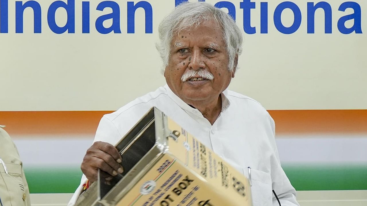 Madhusudan Mistry shows the empty ballot box at AICC HQ in New Delhi on Monday. Credit: PTI Photo