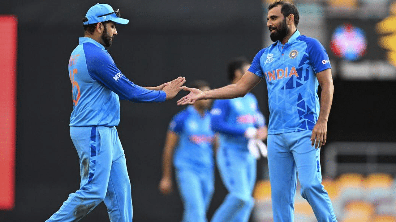 Rohit Sharma (left) and Mohammed Shami (right) after the India-Australia warm-up match. Credit: AP/PTI Photo