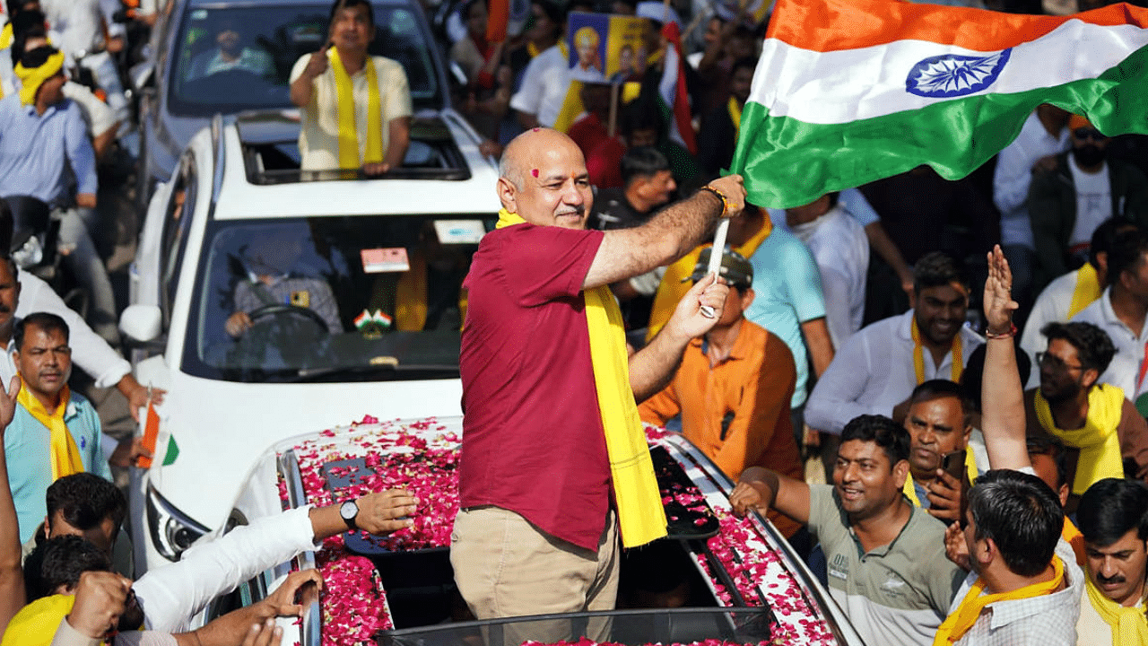 Delhi Dy CM Manish Sisodia at the party office before leaving for the CBI headquarters for questioning. Credit: PTI Photo