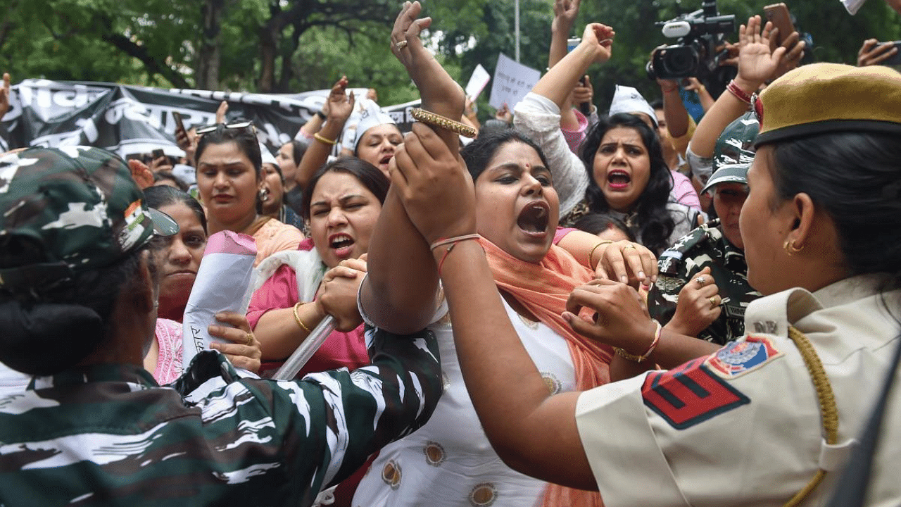 AAP women protestors express outrage at Ankita Bhandari's murder. Credit: PTI Photo