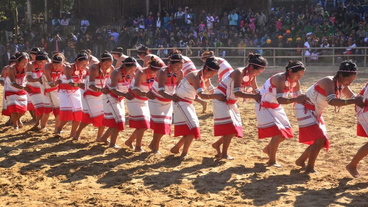Members of a Naga tribe perform a the Hornbill festival at village Kisama, near Kohima. Credit: PTI File Photo