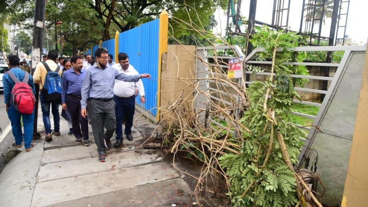 BBMP bossman Tushar Girinath and his team inspect an area near Hennur on Monday morning. Credit: Special Arrangement