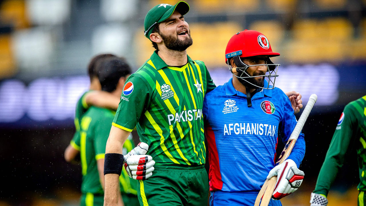 Pakistan's Shaheen Shah Afridi (L) embraces Usman Ghani (R) as they both walk off together during the ICC men's Twenty20 World Cup 2022 cricket warm-up match between Afghanistan and Pakistan. Credit: AFP Photo