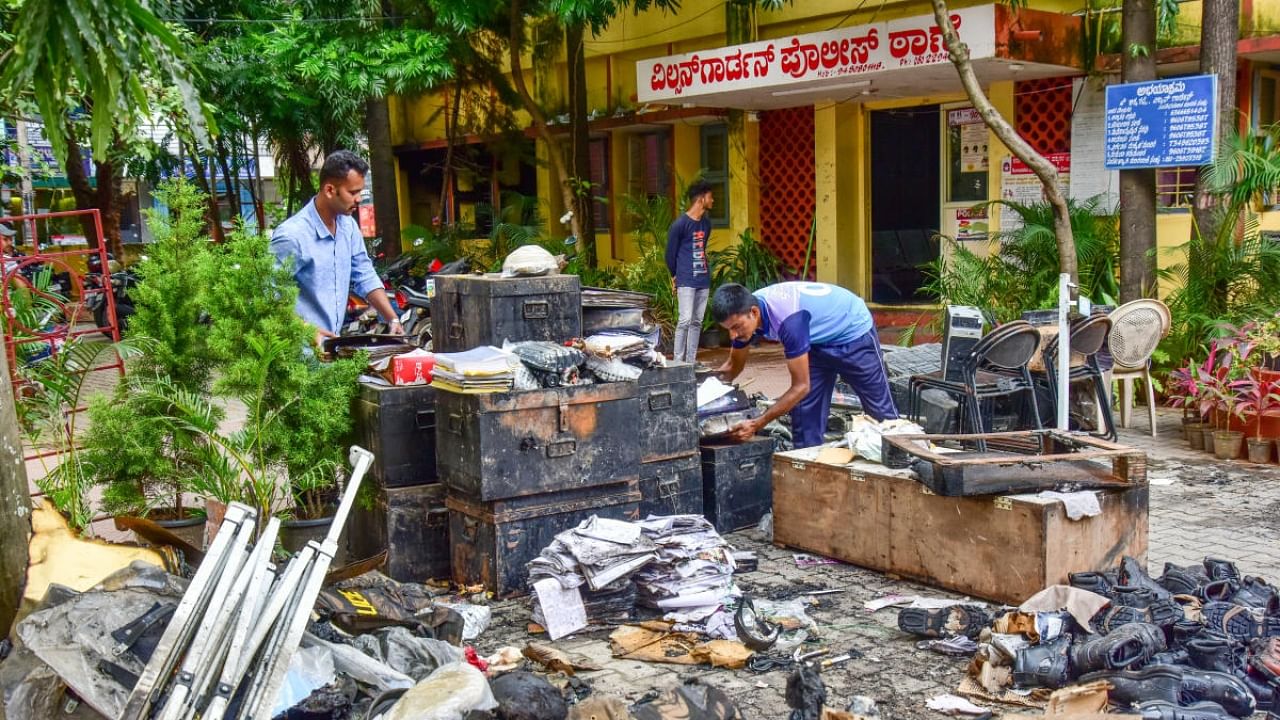 Staff posted at the police station noticed smoke and fire billowing from the ground-floor storeroom around 6 am. Credit: DH Photo