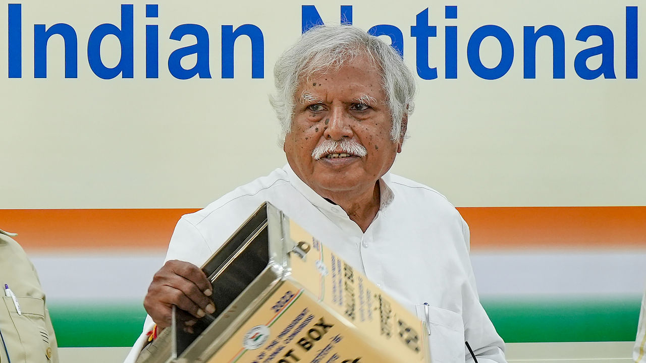 Congress' central election authority chairman Madhusudan Mistry shows the empty ballot box before the start of voting for the party's Presidential election at AICC headquarters. Credit: PTI Photo