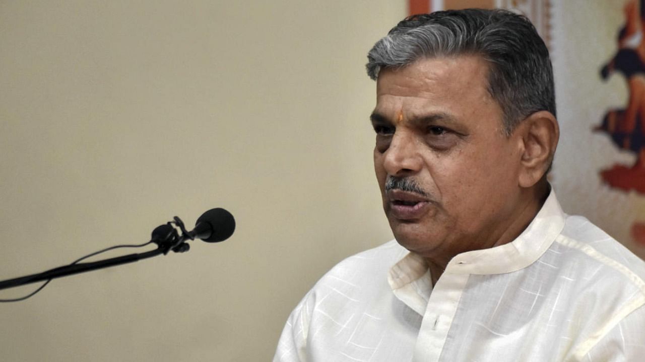 RSS General Secretary Dattatreya Hosabale at a press conference near Prayagraj on Wednesday. Credit: PTI Photo