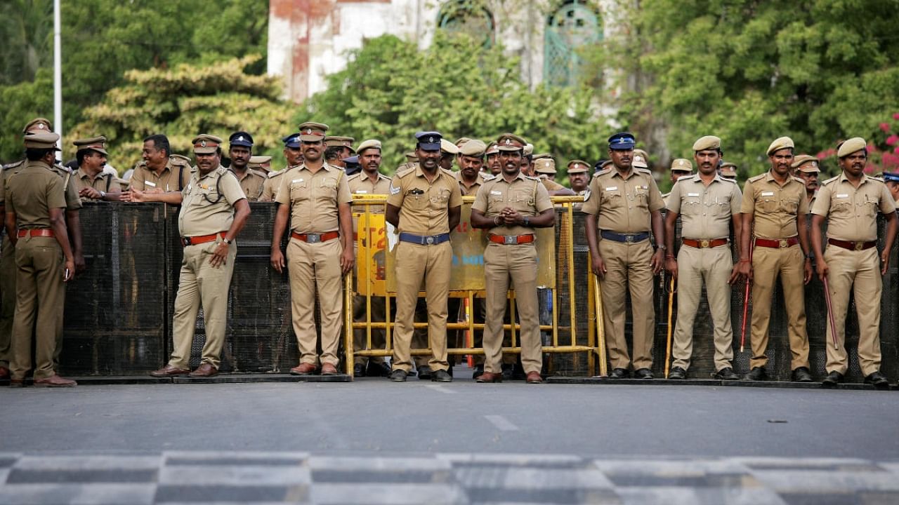 Policemen stand guard ahead of a protest in Thoothukudi. Credit: Reuters File Photo