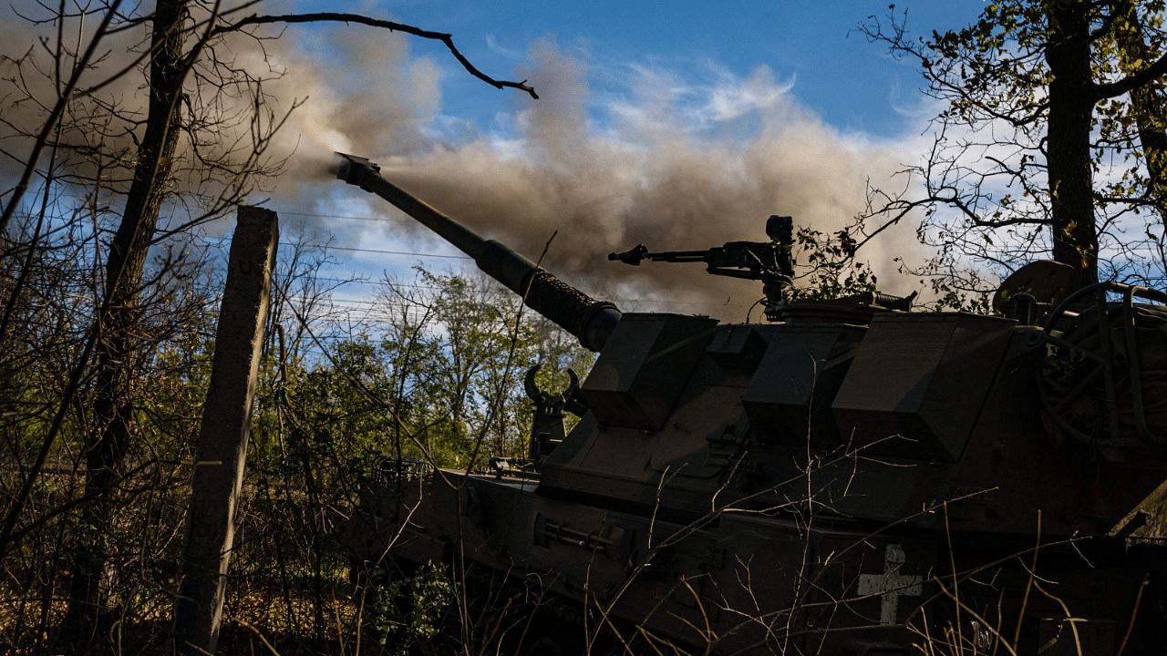 Ukrainian servicemen fire a Polish 155mm self-propelled tracked gun-howitzer Krab from a position on the front line in the Donetsk region. Credit: AFP Photo