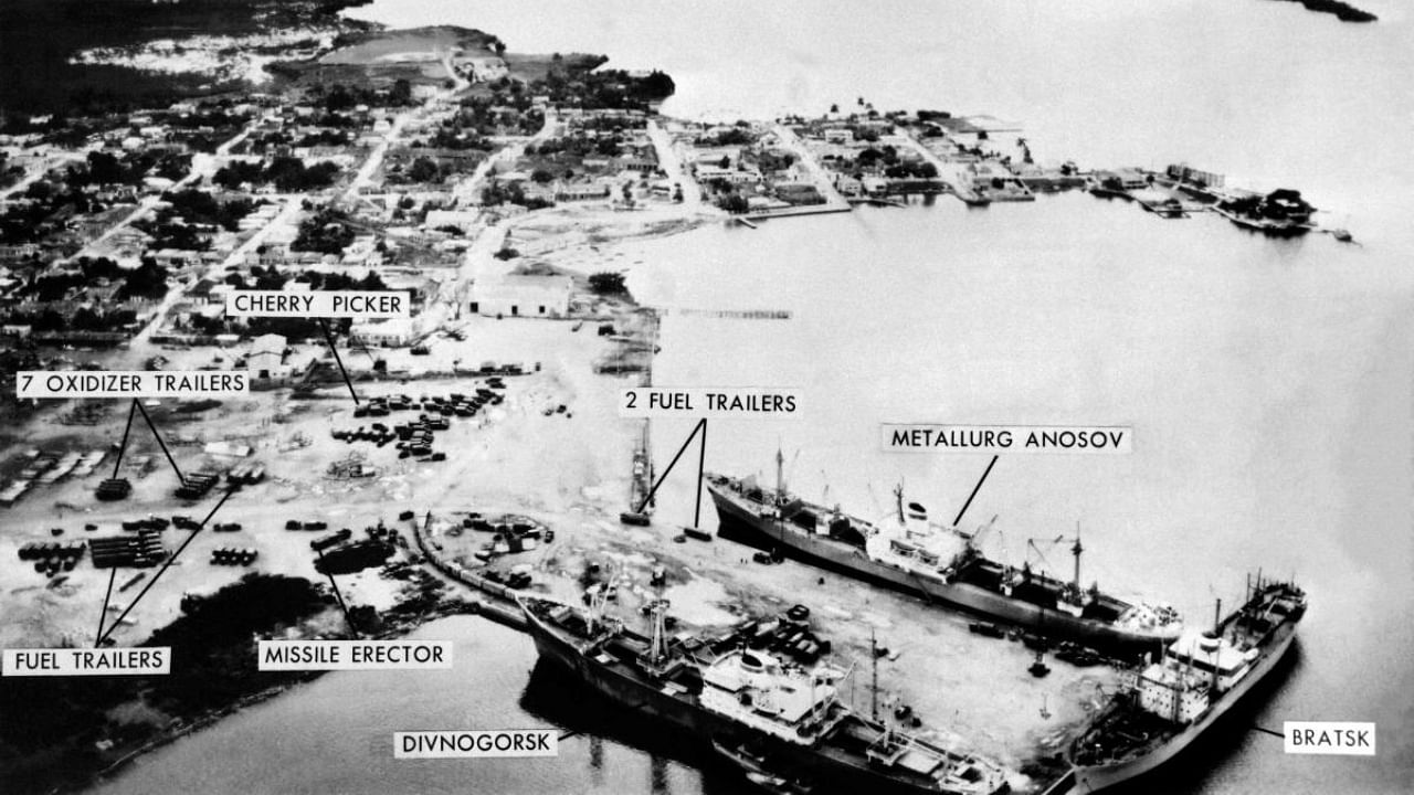This file picture taken on November 10, 1962, shows an aerial view of the Mariel naval port , west of Havana, showing three soviet ships waiting to be loaded with the missiles in accordance with the US-Soviet agreement on the withdrawal of the Russian Missiles from Cuba, during the Cuban missiles crisis. Credit: AFP Photo
