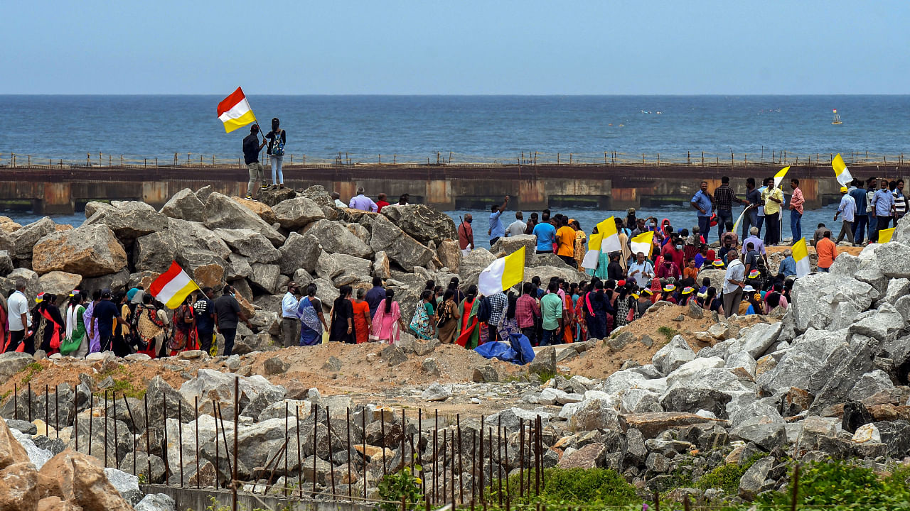 People belonging to fishing community along with activists stage a protest against Adani Group's port development project at Vizhinjam, in Thiruvananthapuram, Thursday, Aug. 25, 2022. Credit: PTI File Photo