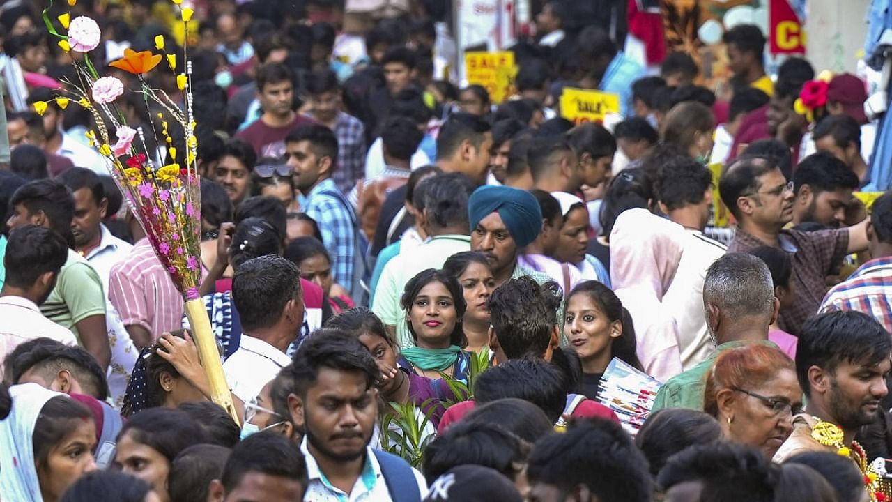 People visit a crowded Sarojini Nagar Market ahead of Diwali festival, in New Delhi. Credit: PTI Photo